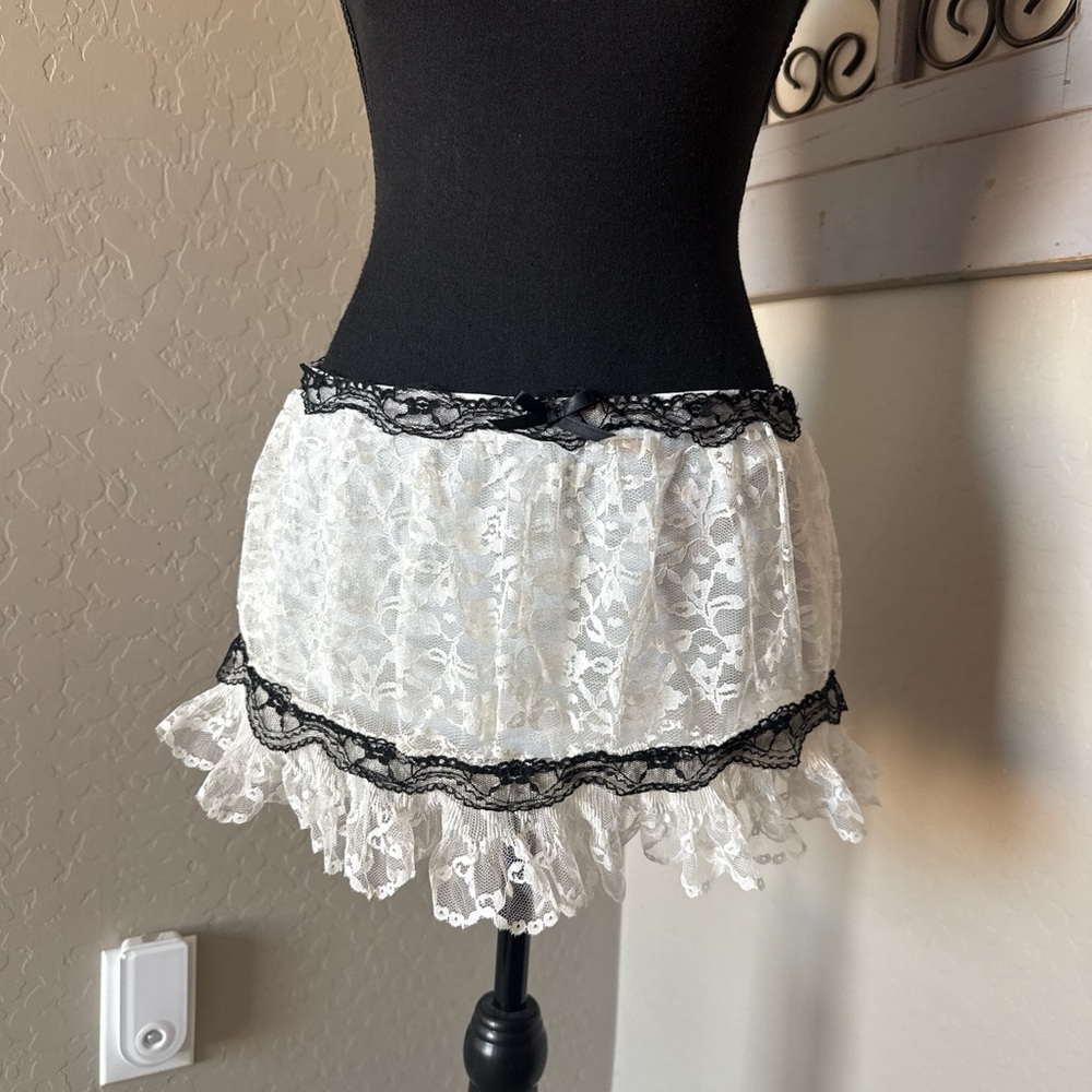 Pieces Of Porcelain Lace White Mini Skirt with Black Trim